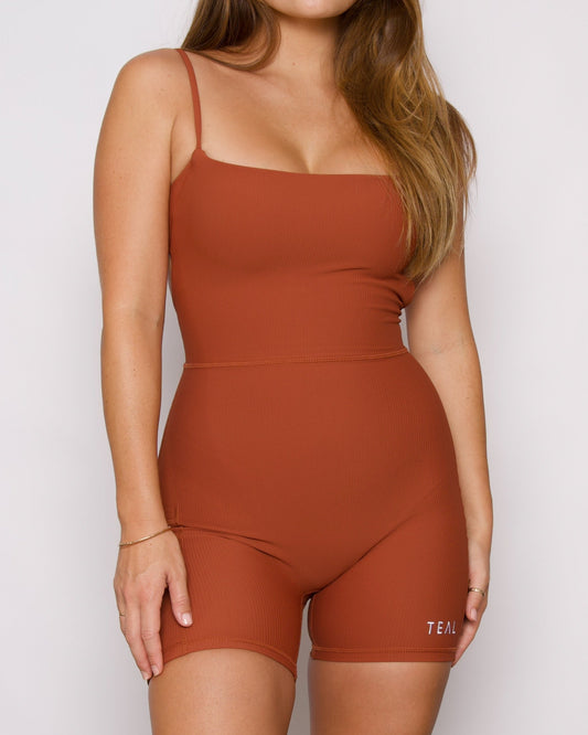 KAYLA JUMPSUIT 4.5” - RUST - Active By Teal